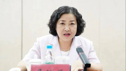 屈玲妮，被查